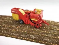 Grimme SE 75-30 Kartoffelvollernter mit 80 Kartoffelimitaten, Modellfahrzeug