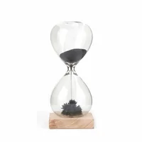 Kikkerland Aufsteller Magnetic Sand Transparent/Nature - Produkttyp: Sanduhr - Motiv: Ohne Motiv - Detailfarbe: Nature - Transparent - Detailmaterial: Buche - Glas - Grundmaterial: Glas - Holz