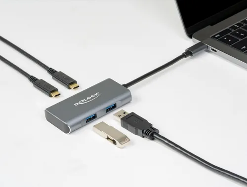 Delock USB 3.1 Hub - Stromversorgung: USB - Anzahl Ports: 4 - Detailfarbe: Grau - USB Standard: 3.1 Gen 2 (10 Gbps) - USB Anschluss 2 (Endgerät): USB A - USB C - USB Anschluss 1 (Quelle): USB C