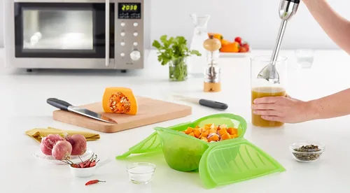 Lékué Mikrowellen-Dampfgarer Tief Grün - Material: Silikon - Detailfarbe: Grün - Set: Nein - Unterteilungsmöglichkeit: Nein - Fassungsvermögen: 0.65 l