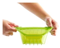 Lékué Mikrowellen-Dampfgarer Tief Grün - Material: Silikon - Detailfarbe: Grün - Set: Nein - Unterteilungsmöglichkeit: Nein - Fassungsvermögen: 0.65 l