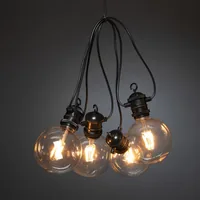Konstsmide Lichterkette Erweiterung, 10 LEDs, Transparent - Betriebsart: Netzbetrieb - Leuchten Kategorie: Lichterkette - Lampensockel: LED fest verbaut - Leuchtenfarbe: Schwarz - Transparent - Aussenanwendung: Ja - Lichtfarbe: Bernstein