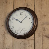 Esschert Design Gartenuhr Braun, Ø 30.5 cm - Form: Rund - Detailfarbe: Braun - Uhrtyp: Analog - Funksignal: Nein - Funktionen: Zeit - Thermometer - Detailmaterial: Polyvinylchlorid (PVC) - Kunststoff