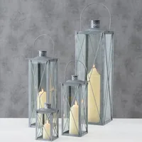 Boltze Laterne Farol 4-teilig, Transparent/Grau - Detailfarbe: Grau - Transparent - Höhe: 20 cm - 36 cm - 50 cm - 70 cm - Detailmaterial: Eisen - Glas - Metall - Grundmaterial: Glas - Metall