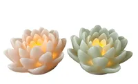 Dameco LED Wachskerze Lotus Blüte 2er Set rosa und türkis grün - Betriebsart: Akkubetrieb - Fernbedienung: Nein - Aussenanwendung: Ja - Höhe: 16 cm - Timerfunktion: Nein - Set: Ja
