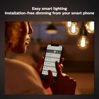 Philips Hue Leuchtmittel White E27 Einzelpack Filament 550 lm - Lampensockel: E27 - Farbtemperatur Kelvin: 2100 K - Aussenanwendung: Nein - Gesamtleistung: 7.2 W - Lichtfarbe: Warmweiss (WW) - Leuchten Kategorie: Leuchtmittel