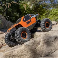 Axial Rock Crawler AX24 XC-1 4WS, Orange, RTR, 1:24 - Fahrzeugtyp: Rock Crawler - Antrieb: 4x4 - Antriebsart: Elektro Brushed - Modellausführung: RTR (Ready to Run) - Benötigt zur Fertigstellung: Kein weiteres Zubehör nötig - Detailfarbe: Orange