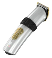 Trisa Bart- &  Haarschneider Gold Cut - Rasierart: Trocken - Körperbereich: Bart - Kopf - Detailfarbe: Silber - Minimale Schnittlänge: 4 mm - Maximale Schnittlänge: 20 mm - Trimmer Funktionen: Bartschneider - Haarschneider