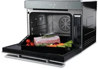 Trisa Dampfgarer Combi Steamer 40 l - Detailfarbe: Schwarz - Ausstattung: Timer - Einstellbare Temperatur - Funktionen: Backen - Heissluft - Dampfgaren - Dörren - Leistung: 2400 W